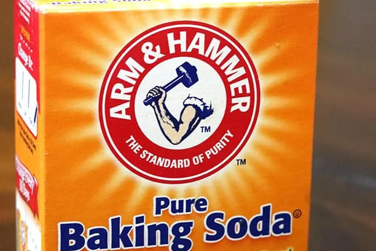 Baking soda bath setup with a basin of lukewarm water and plain baking soda
