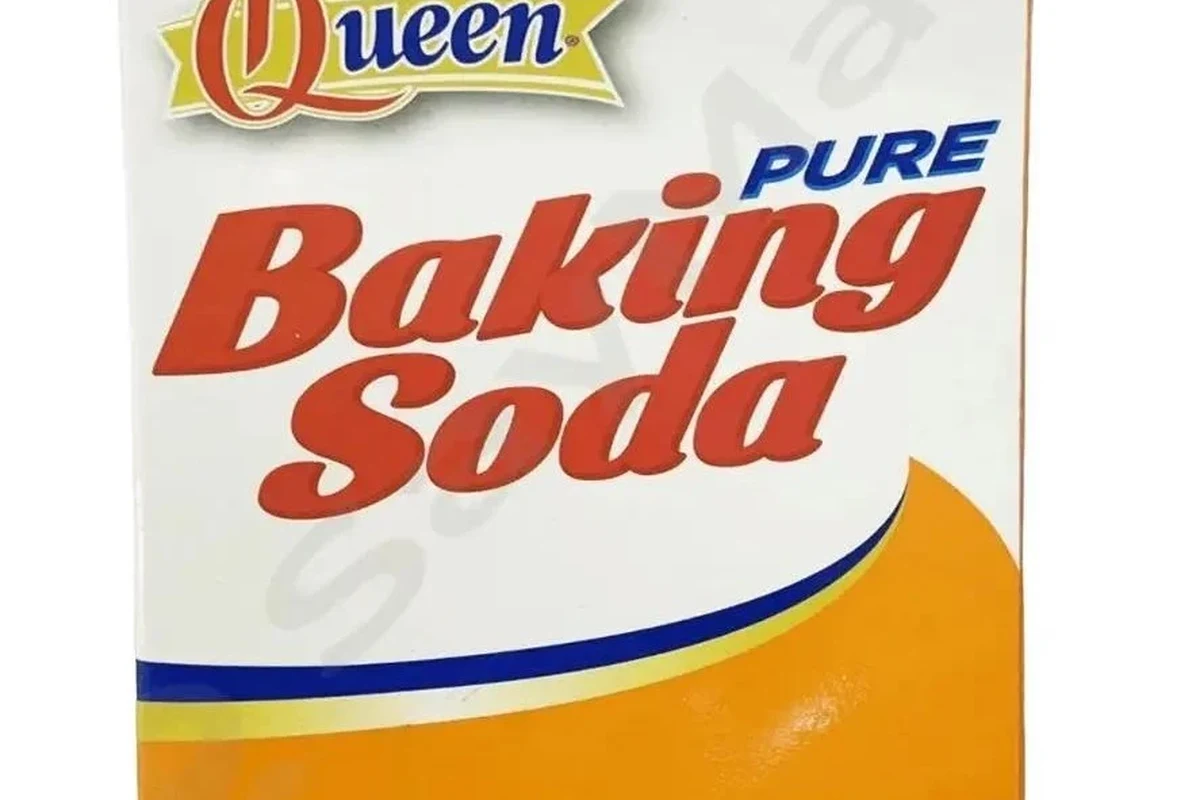 Baking soda package and baking ingredients on a kitchen counter in the Philippines