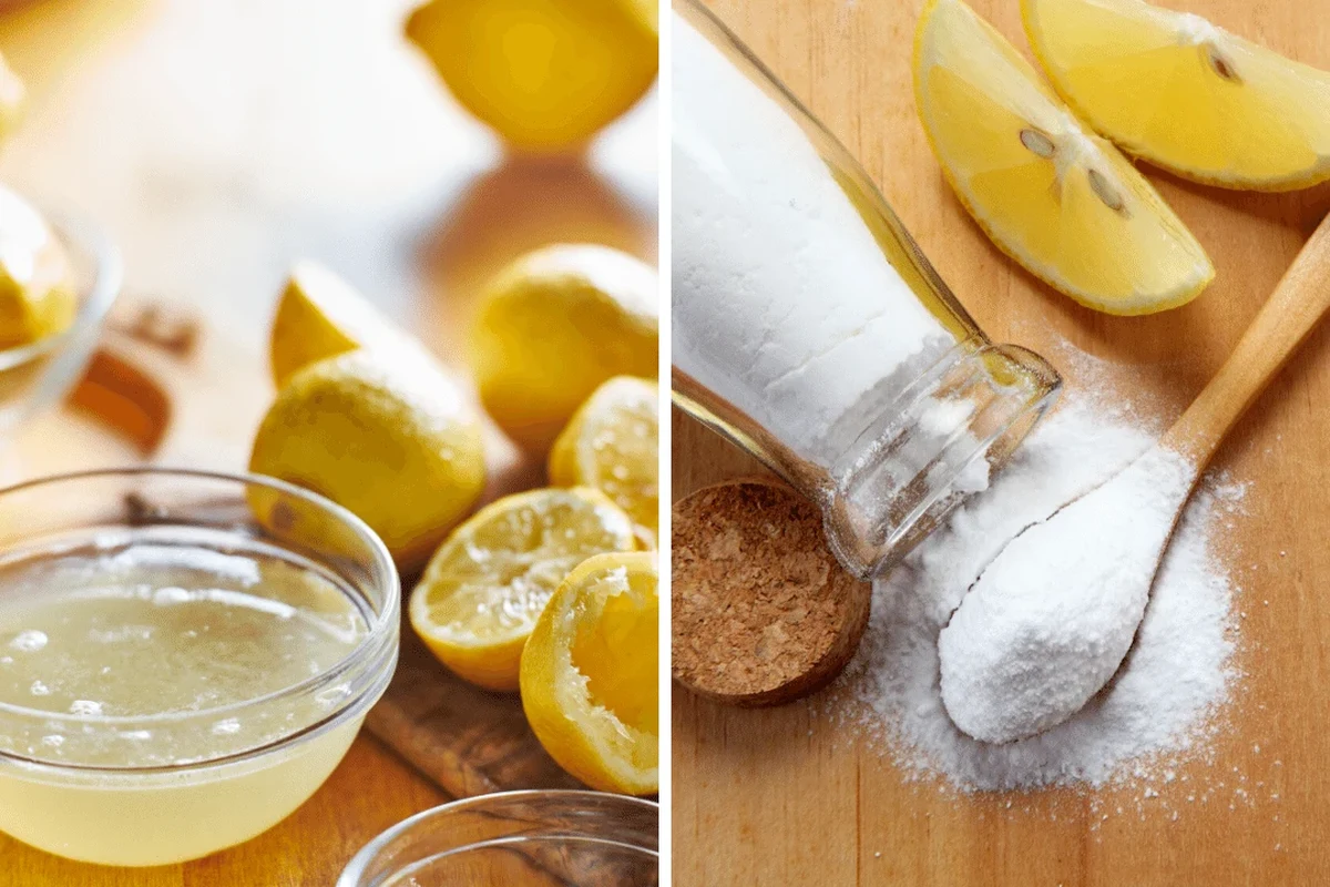 Glass of baking soda and lemon water with sliced lemon on a kitchen counter