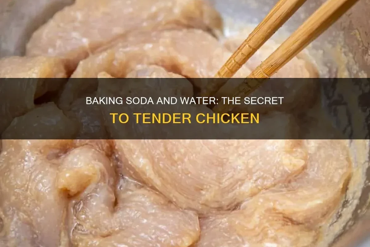 Raw chicken pieces coated lightly with baking soda in a mixing bowl for tenderizing