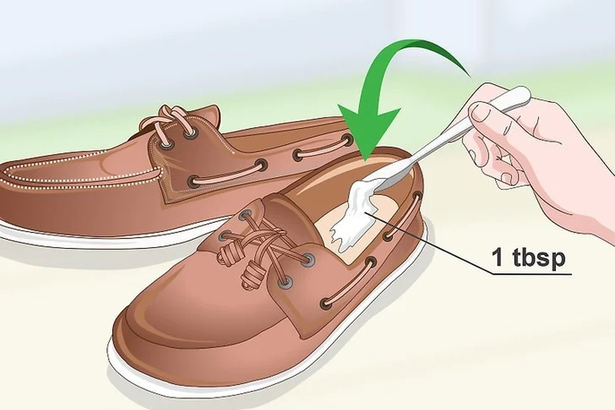 Baking soda sprinkled inside a pair of sneakers for fast shoe odor removal