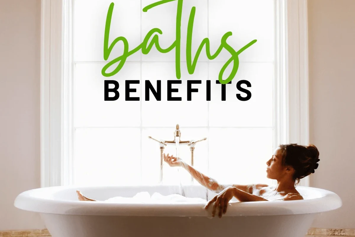 Person relaxing in a warm bath with Epsom salt and baking soda
