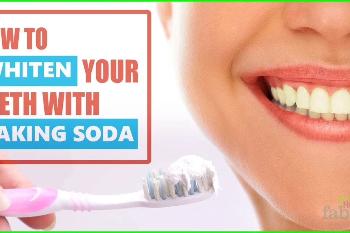 Person brushing teeth with baking soda paste beside a bathroom sink