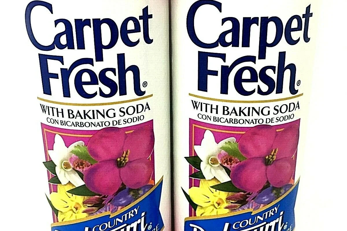 Baking soda sprinkled on a carpet rug for odor removal