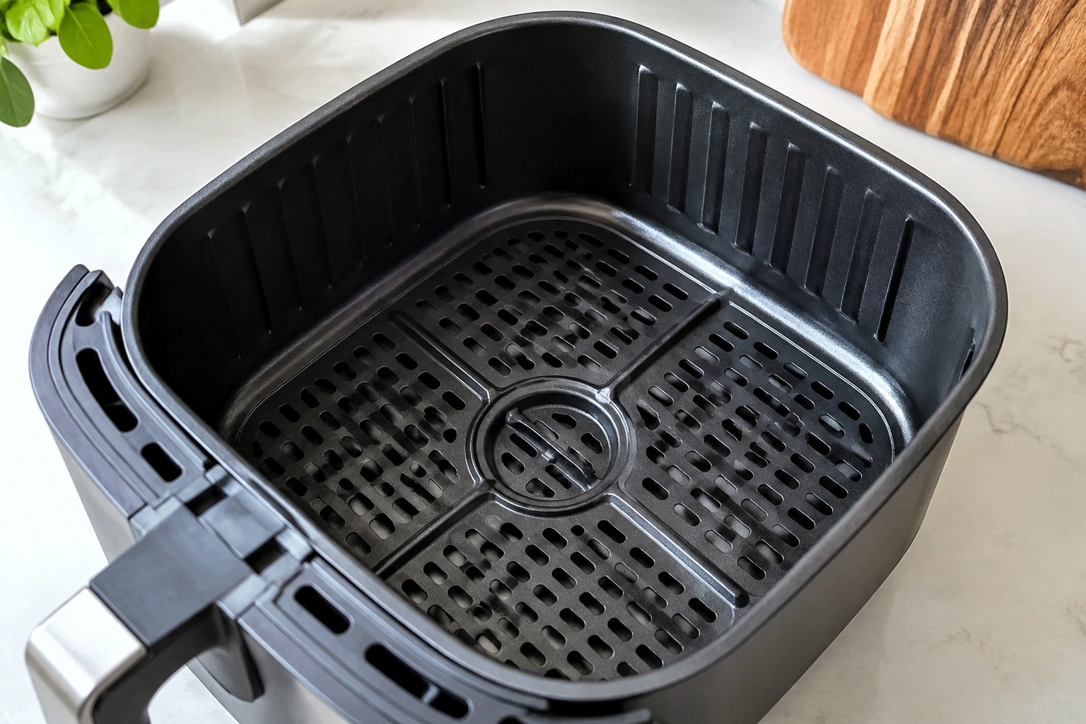 Close-up of a Teflon-coated air fryer basket